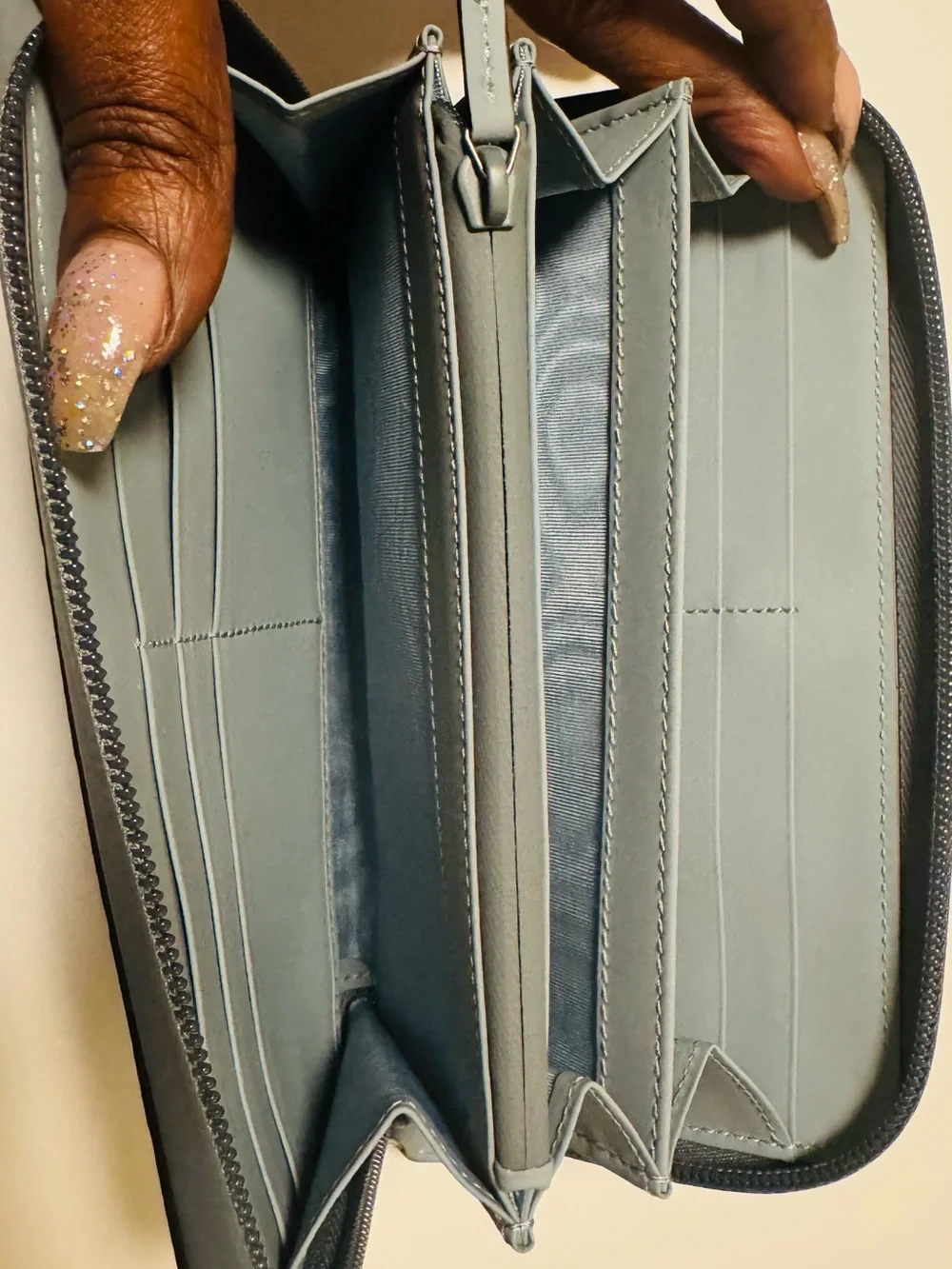 Gucci Light Blue Embossed GG Zip-Around Wallet